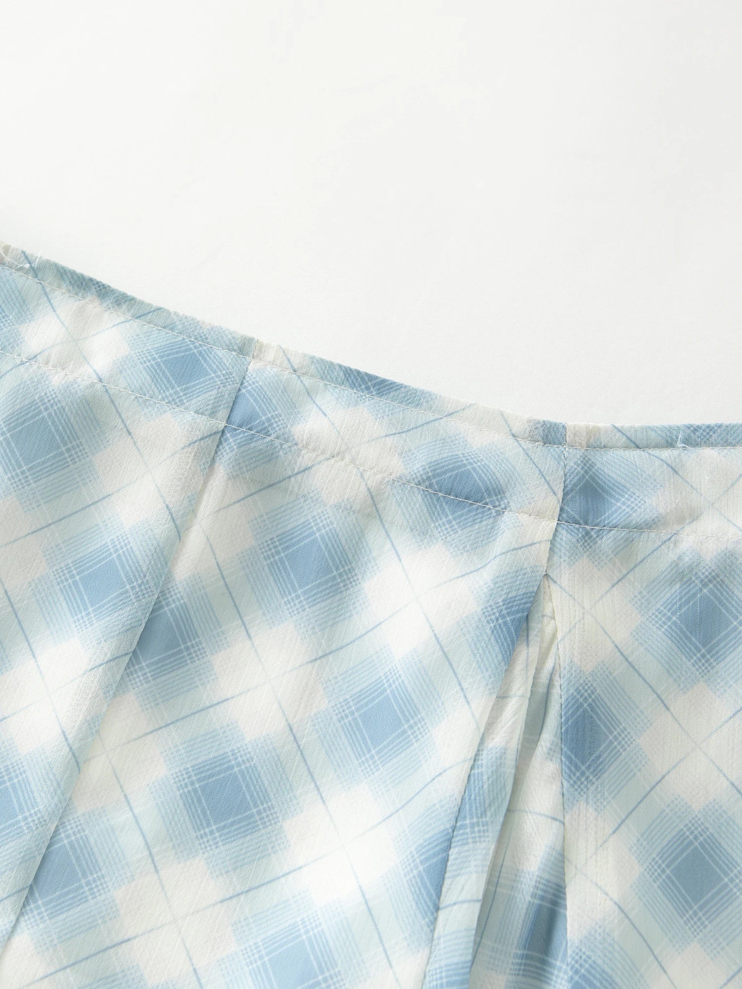 FSLE Women's Summer 2025 New Arrival Irregular A-line Hem Plaid Skirt Flowing Relaxed Fit Skirts