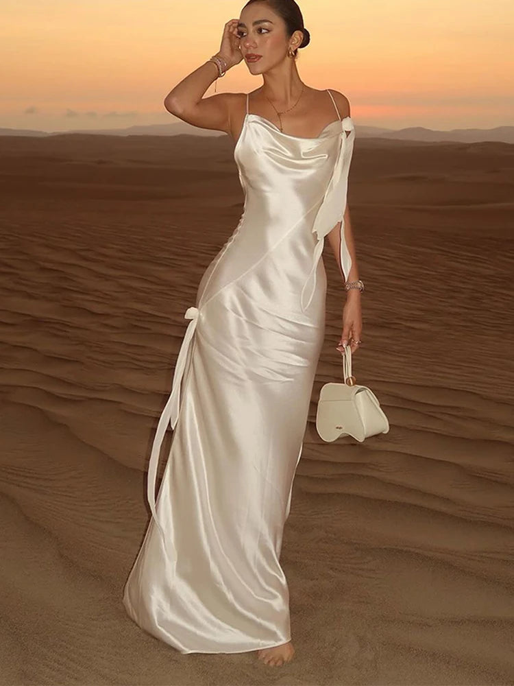 Elegant White Satin Backless Maxi Dress Women Sexy Sleeveless Spaghetti Strap Flower Decor Robe 2024 Night Club Party Dresses